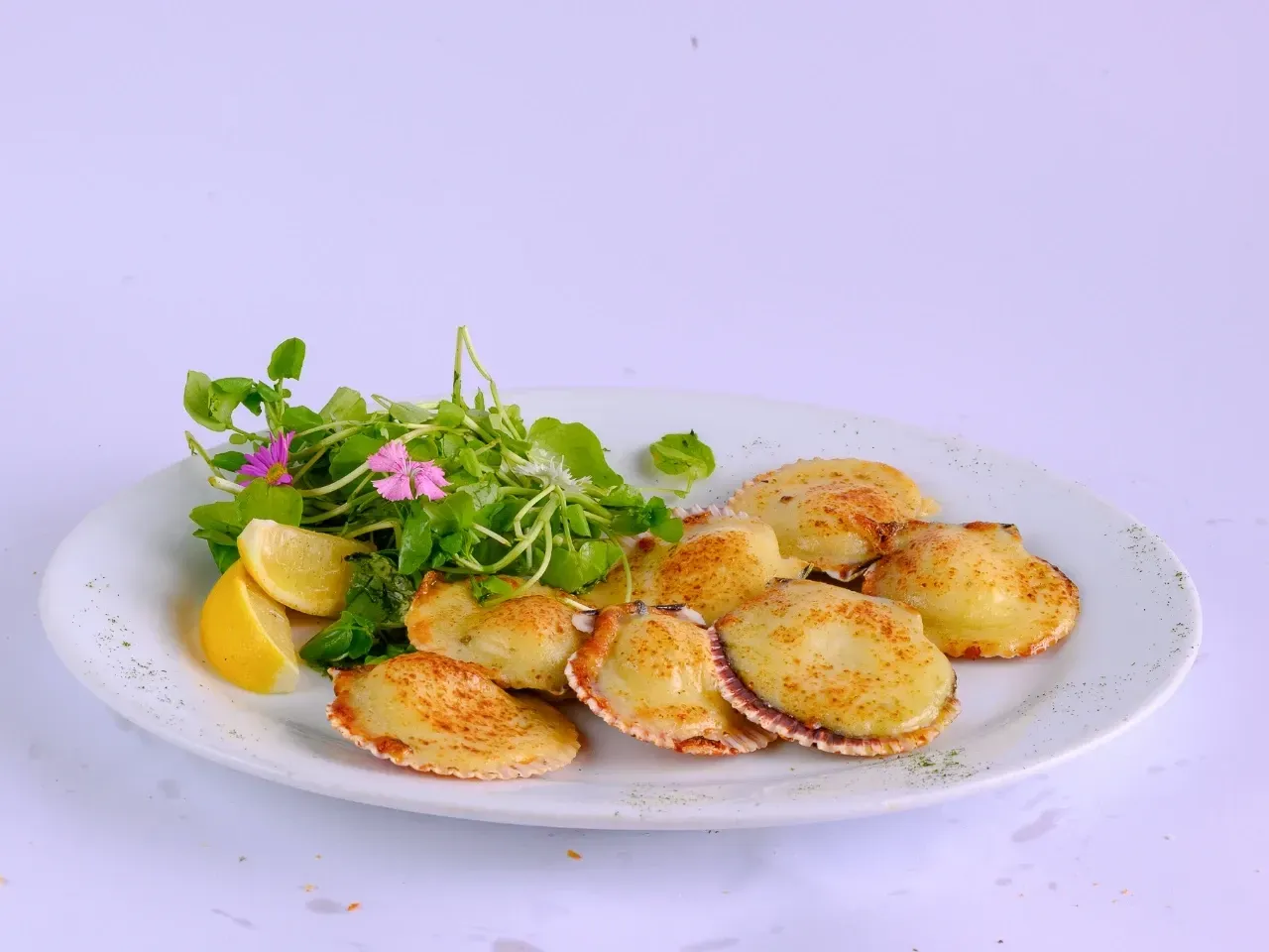 Ostiones a la parmesana